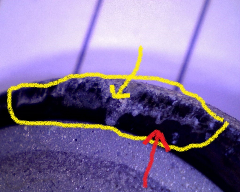Close up of damage on the valve face seat sealing area