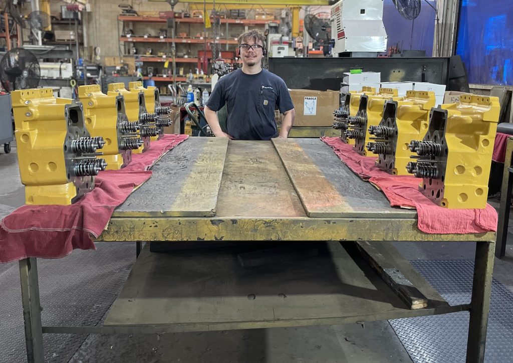 curklan proctor with finished 3500 heads (smiling)2